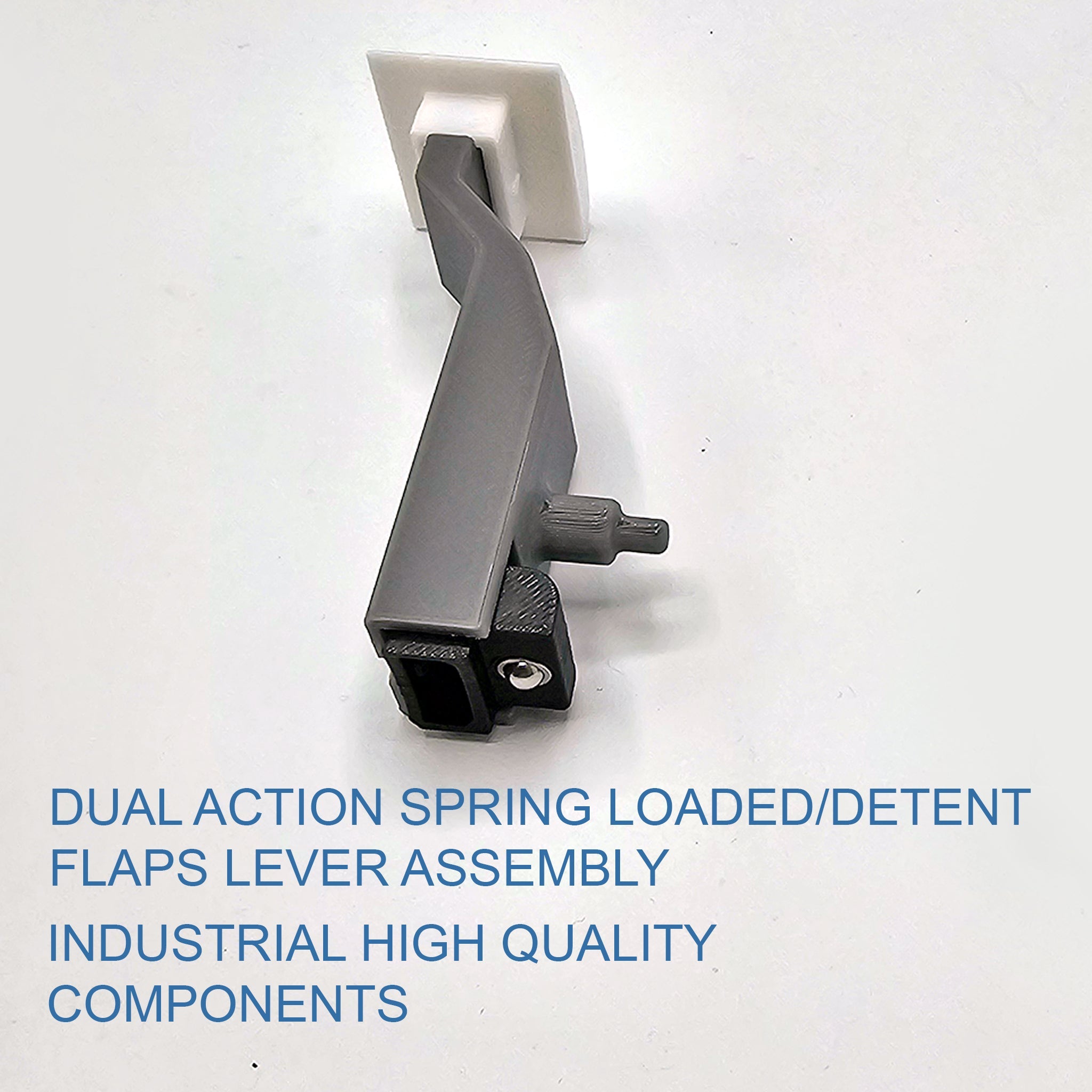 A gray metal dual-action spring-loaded lever assembly featuring a textured grip and a white square mounting plate is displayed on a light surface. Blue text reads: "Boeing 737/757/767/777/787 Spring realistic and professional Spring Loaded flaps from Prodesksim." Ideal for enhancing flight simulation realism and Honeycomb Bravo addons.