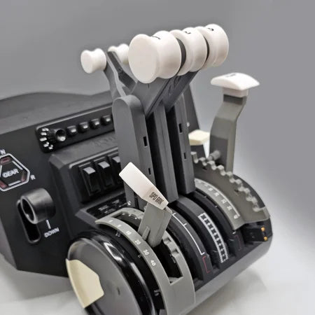 A close-up view of the ProDeskSim Classic Boeing 727 Advanced Full Package Addon/Modification for the Honeycomb Bravo, showcasing multiple levers and switches for an authentic flight simulation experience. This setup includes throttle, speed brake, and flap levers, evoking the classic Three Throttle Boeing 727 configuration against a gray background.