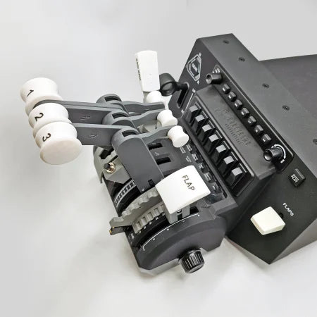 Close-up of the ProDeskSim Classic Boeing 727 Advanced Full Package Addon/Modification for Honeycomb Bravo and Flight simulator, showcasing a throttle quadrant with labeled levers numbered 1, 2, and 3. This device includes switches, knobs, and a flap control to deliver an authentic flight simulation experience against a light gray background.