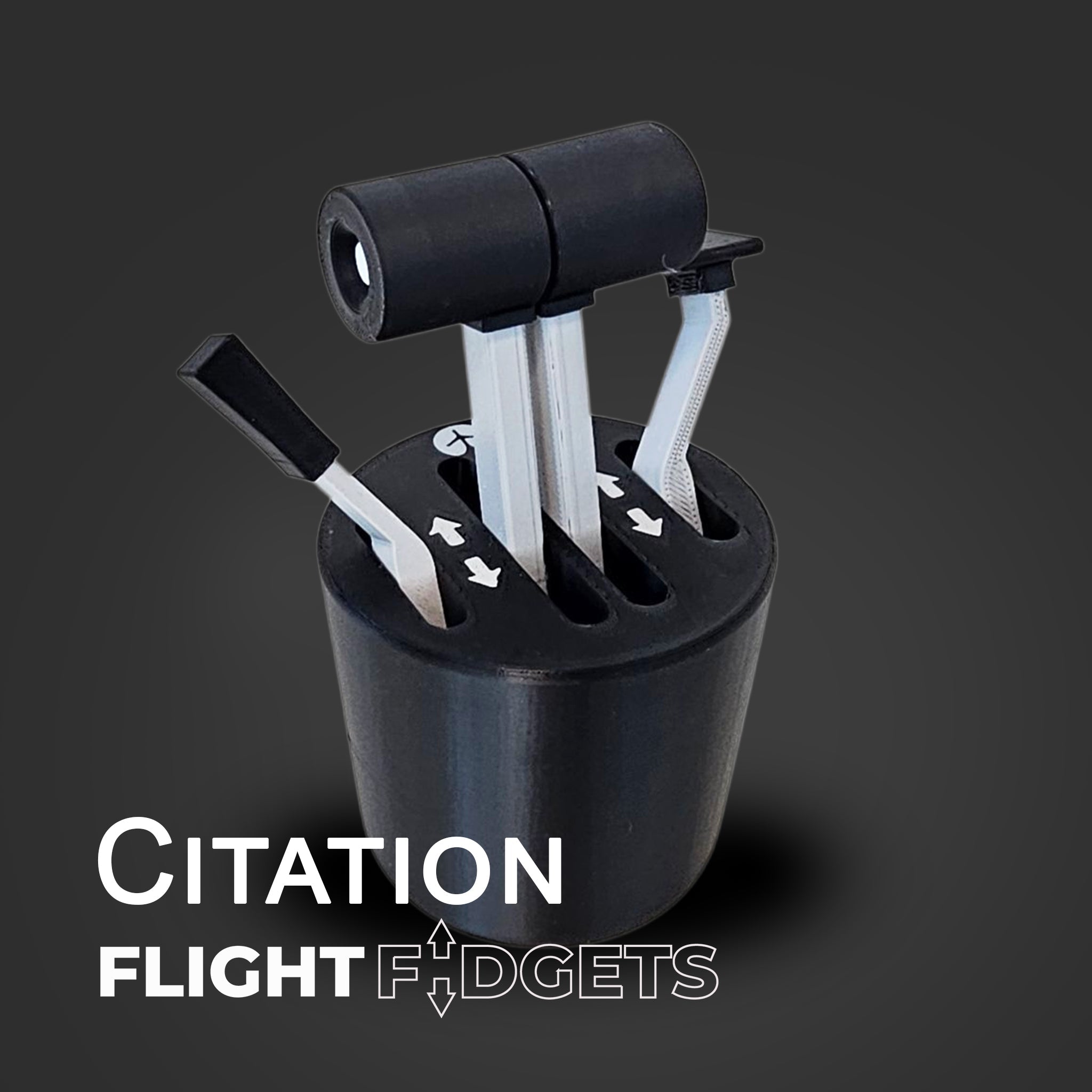 The Citation - The Cup Holder Flight Fidget by FlightFidgets.com is a black desktop toy shaped like an aircraft throttle quadrant, featuring multiple movable levers and a “Citation Flight Fidgets” label on a dark background. Perfect for airplane fans.