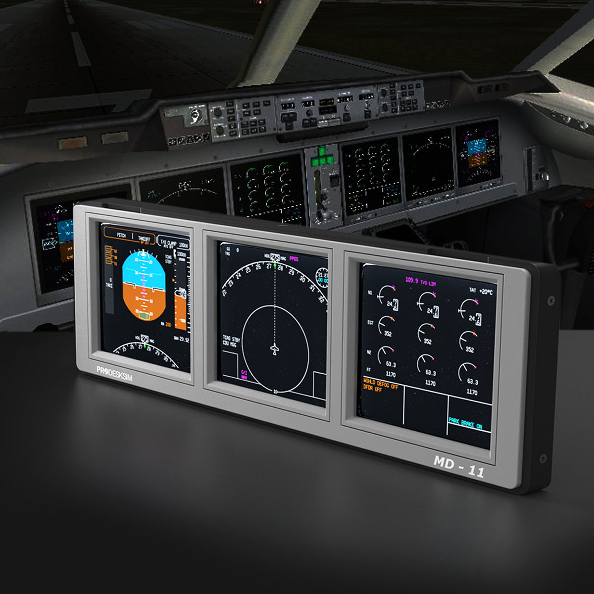 A close-up of the Prodesksim ProDeskSim Modular Display Unit sits on a desk, featuring interchangeable overlays that replicate various avionics panel configurations—including an “MD-11” layout—while the background reveals an aircraft cockpit with illuminated controls and instruments.