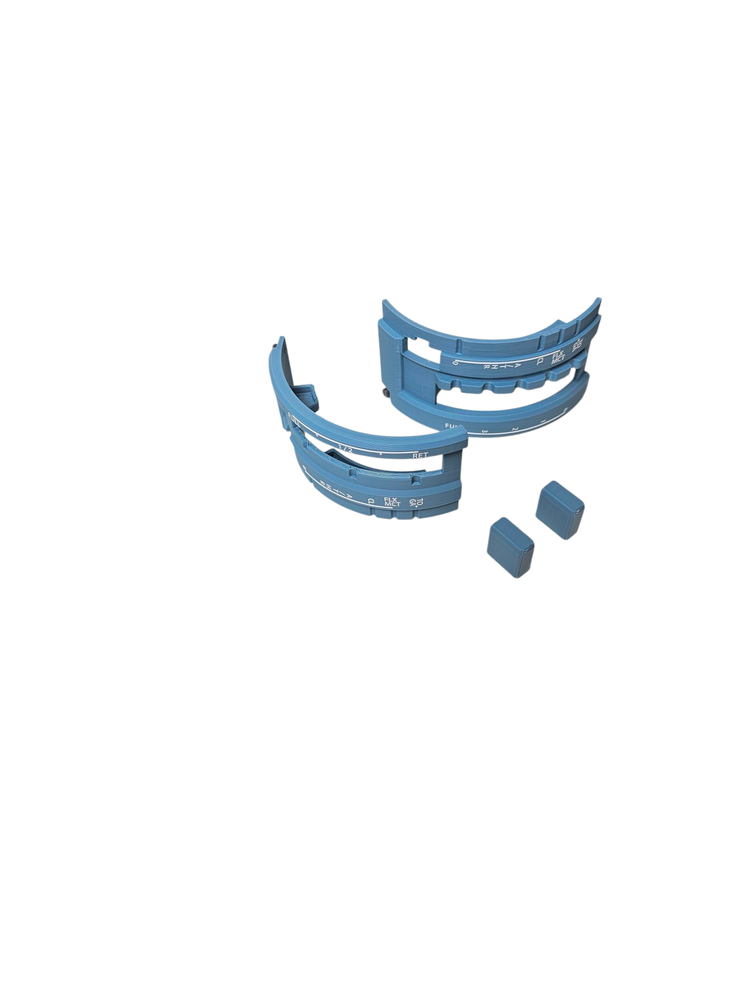 Two blue plastic dental impression trays and two small blue blocks are arranged on a white background, echoing the organized style of the Prodesksim NEW! Airbus A319-A321 Advanced addon for the Honeycomb Bravo throttle quadrant.