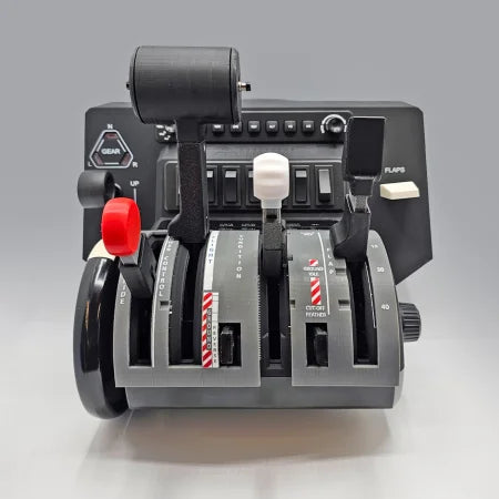 The NEW! ProDeskSim Pilatus PC-12 Addon/Mod package by Prodesksim for the Honeycomb Bravo Throttle Quadrant features a close-up of five colorful levers, tailored for various functions. The gray base includes gear and flap buttons, set against a simple light gray background.