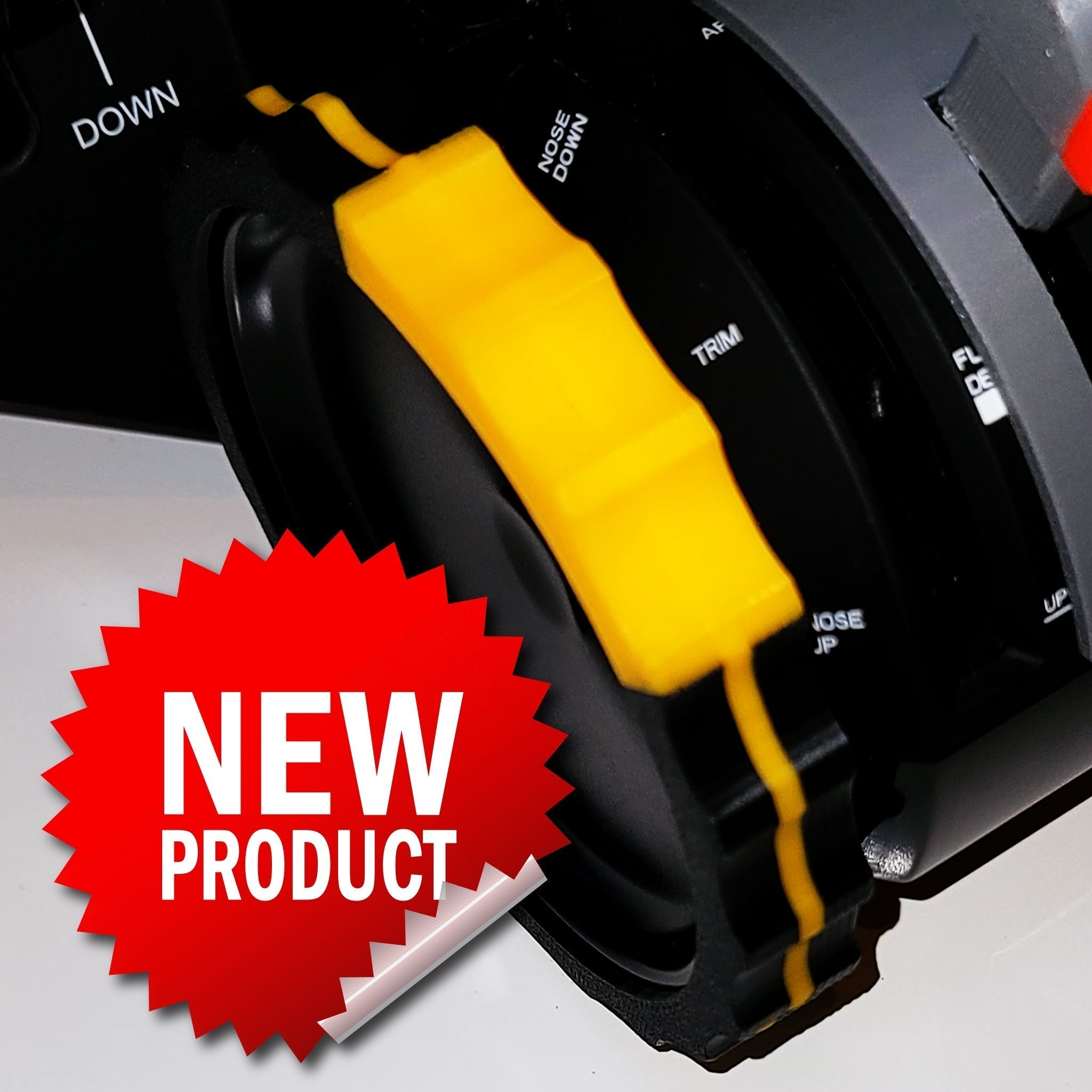 Close-up of Prodesksim's Vibrant Trim wheel cover in yellow for the Honeycomb Bravo Throttle Quadrant, featuring a "TRIM" and "NOSE DOWN" knob. Red starburst reads "NEW PRODUCT." Perfect upgrade for your simulator!.