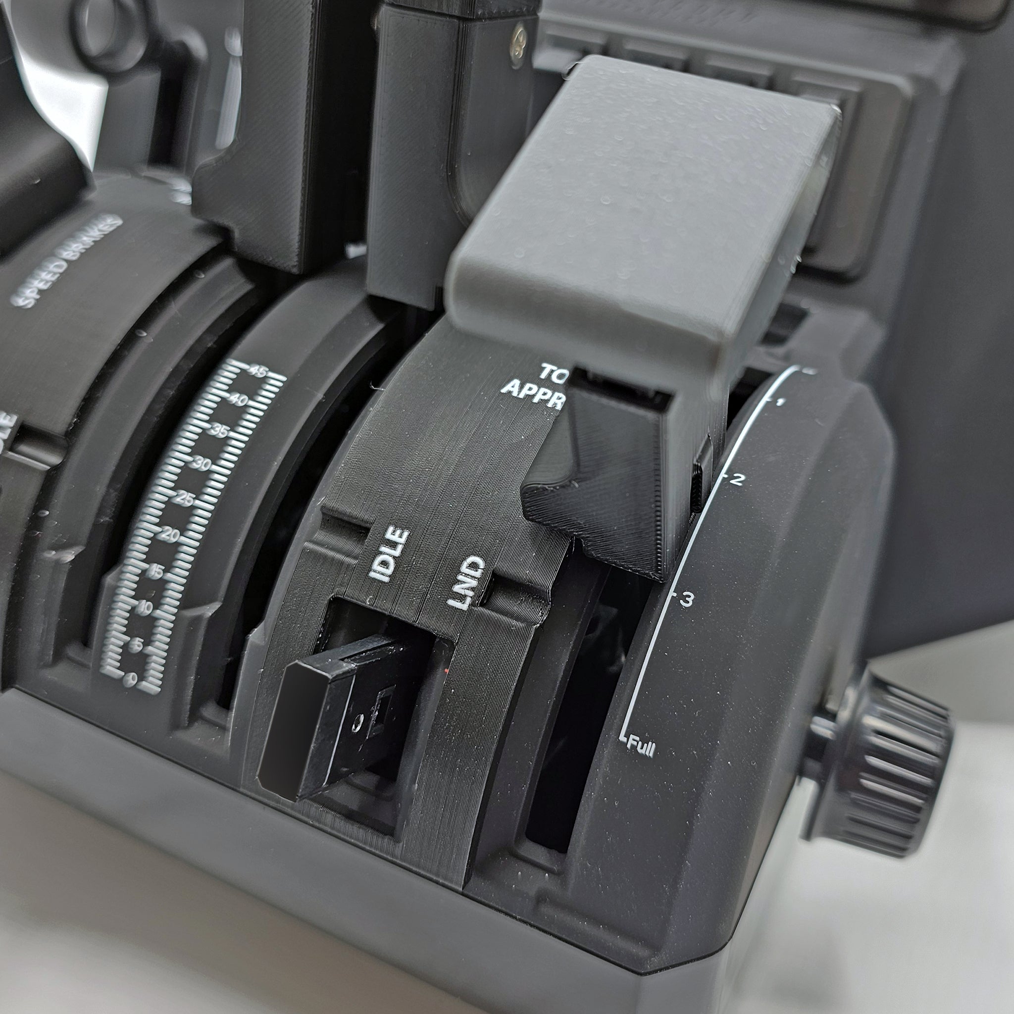 Close-up of the Prodesksim NEW! HA-420 HondaJet Throttle Lever Set for Honeycomb Bravo, showcasing various levers and buttons such as functional GA buttons, flaps, and speed brake detents. The image captures the intricate details and markings on these throttle controls, providing an authentic glimpse into a flight simulation experience.