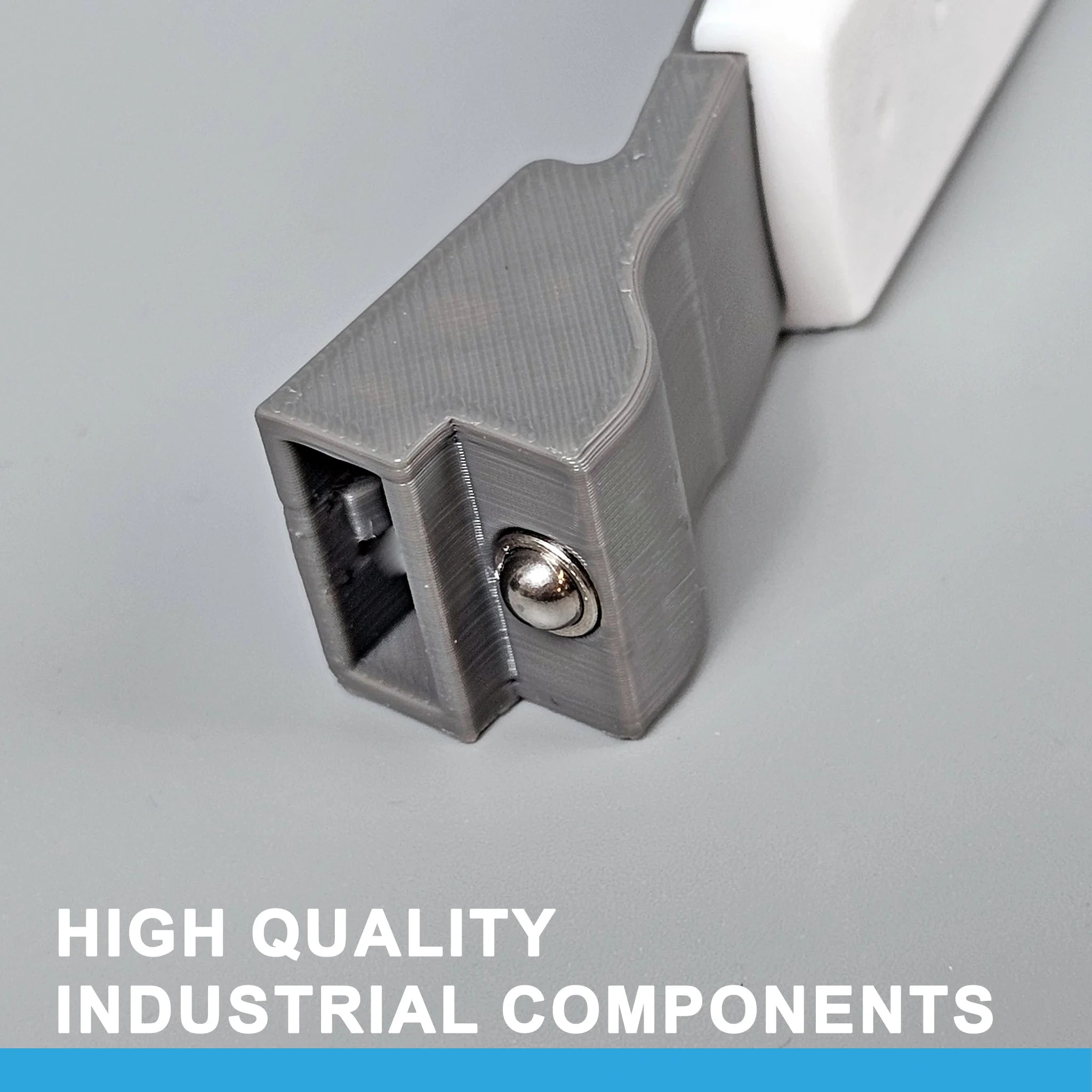 Close-up image of a gray industrial connector featuring a metal ball joint, labeled "High Quality Industrial Components" in white text. Perfect for upgrading your ProDeskSim Boeing 737 Advanced Full Package Addon/Modification for the Honeycomb Bravo throttle quadrant, this connector sits beautifully on a light gray surface, poised to enhance your flight simulation experience.