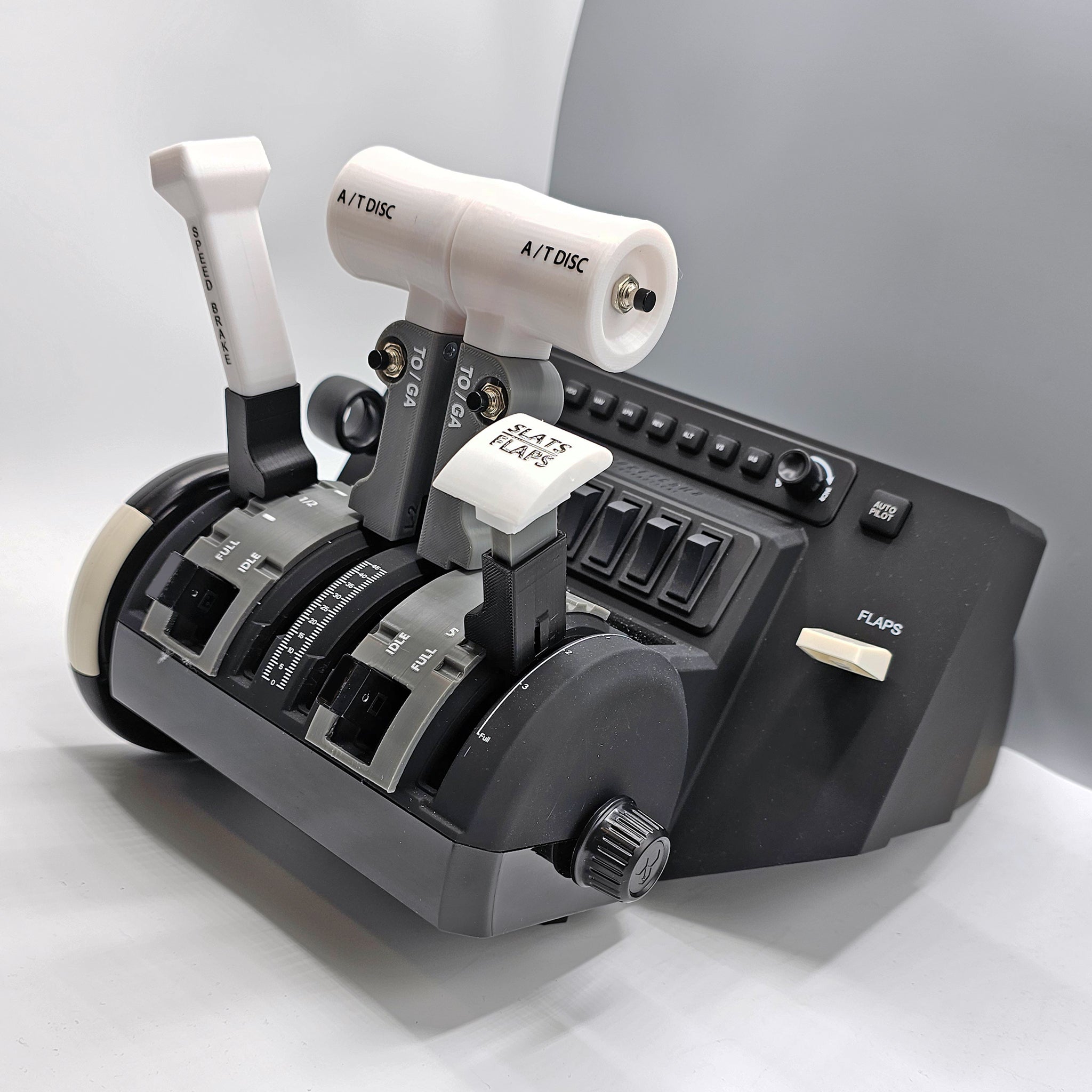 A detailed view of a flight simulator throttle quadrant highlights the NEW! ProDeskSim Honeycomb Bravo addon, expertly crafted for the E-jet series aircraft. This product by Prodesksim features clearly labeled controls and switches that manage various aircraft functions, such as throttle levers and flap controls, all set against a neutral background.