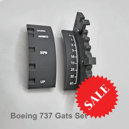 Two black curved components labeled "DOWN," "ARMED," and "UP," featuring a percentage indicator and a scale from 0-40, rest on a flat surface. Text below reads, "Boeing 737 Gats Set." The ProDeskSim Advanced dual action gates and speed brake detent track from Prodesksim is designed to illustrate the flaps systems crucial for simulating flight dynamics.