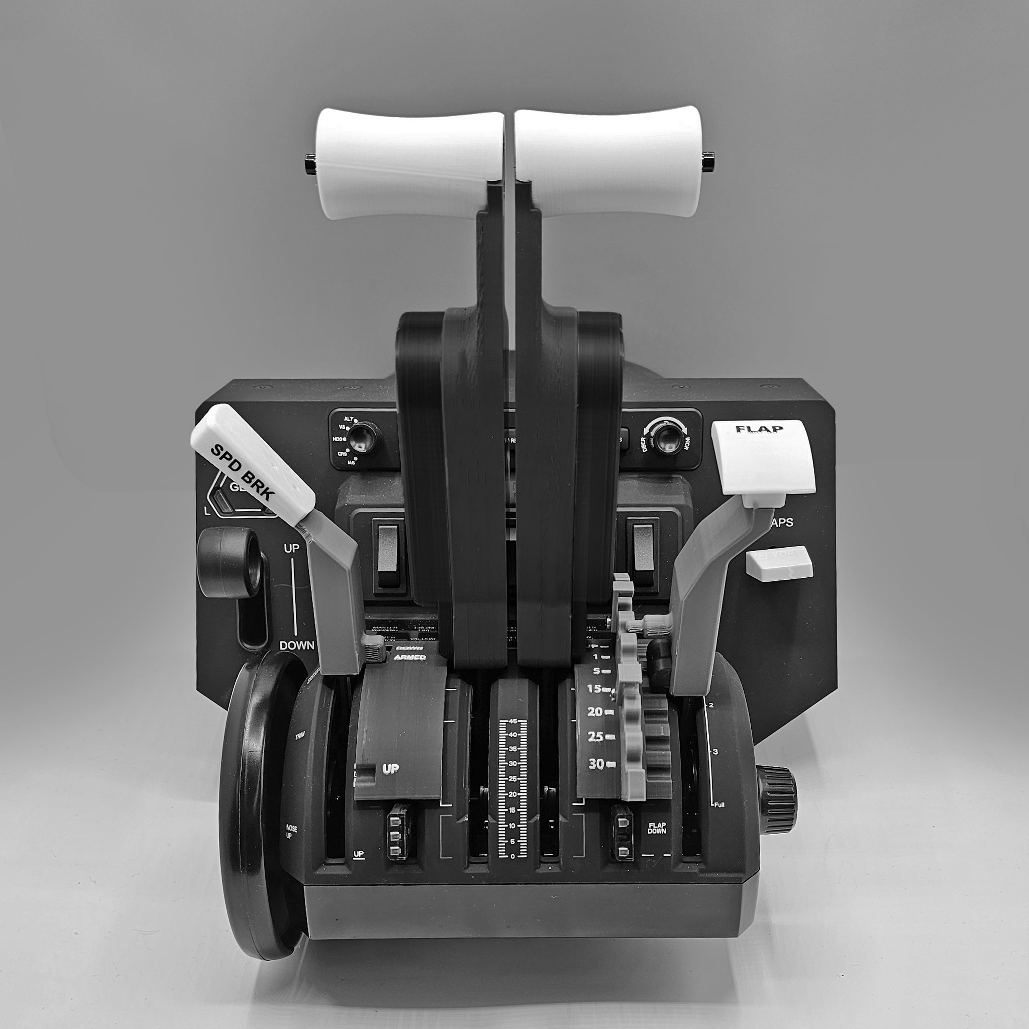 A black and white photo of the Prodesksim Boeing 787-8/9/10 Advanced Action Detent/Spring mechanism showcases levers and controls for speed brake, flaps, and throttle. The handles are prominently featured with labels indicating their function, making it an essential addition to any flight simulation setup that uses the Honeycomb Bravo throttle quadrant.