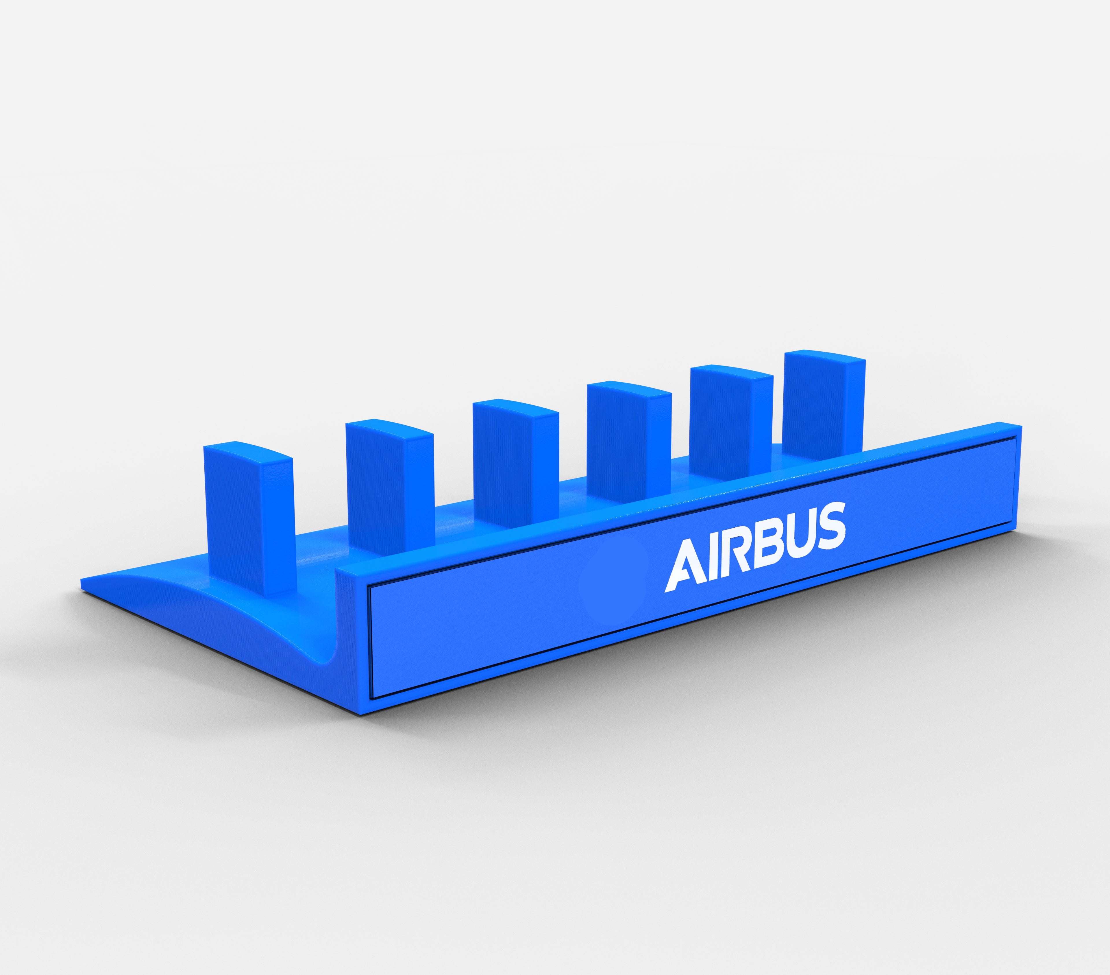 The ProDeskSim Honeycomb Bravo Add-on ORGANIZER is a blue plastic block with protruding pegs resembling a skyline. It features "Airbus" in white on the front, perfect for organizing desks or enhancing your ProDeskSim lever setup against a white background.