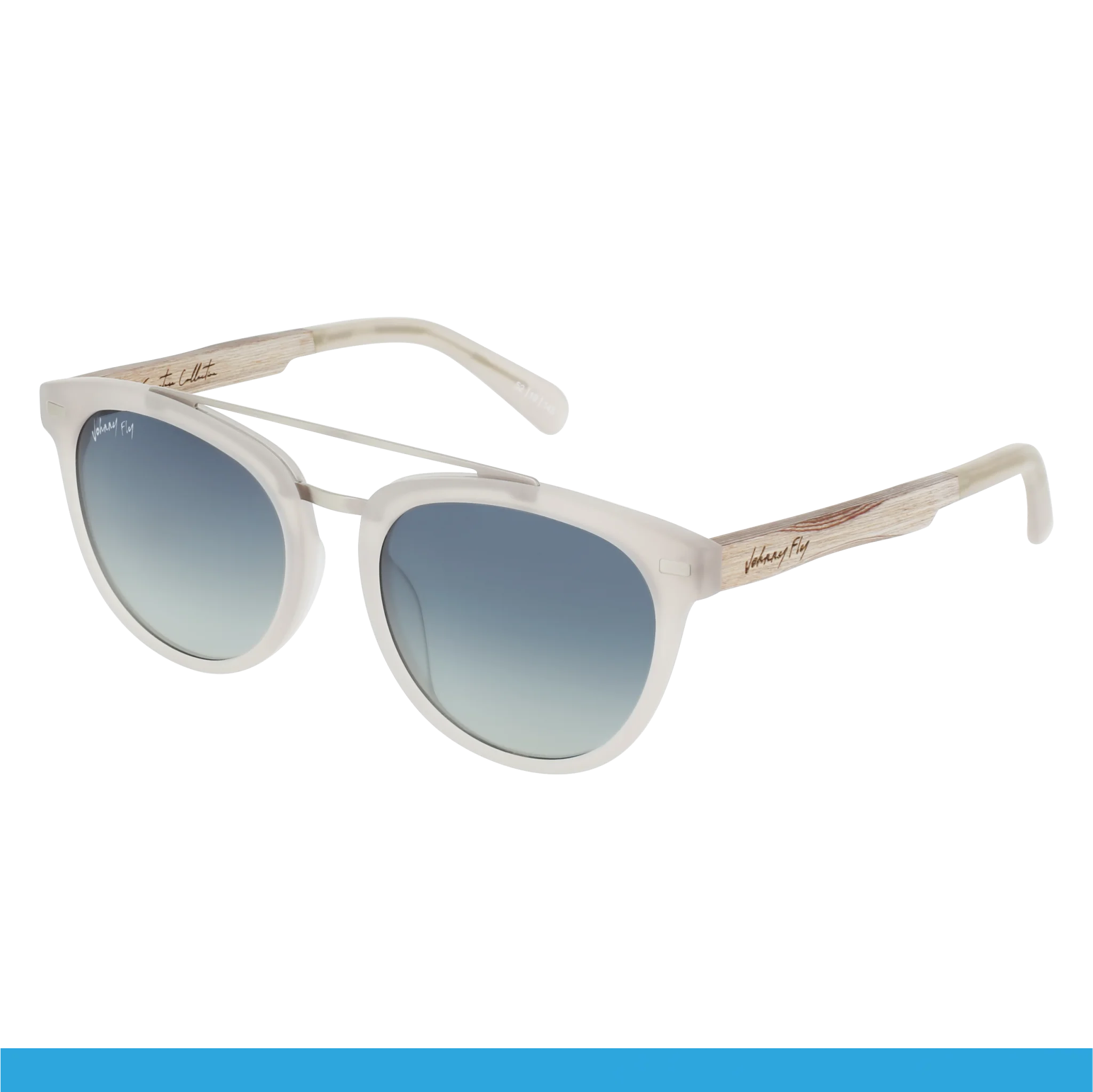 Introducing the Captain sunglasses by Johnny Fly, a fashionable accessory with a translucent white acetate front and gradient blue lenses. The wooden arms are elegantly branded with text and showcase an intricate texture design.