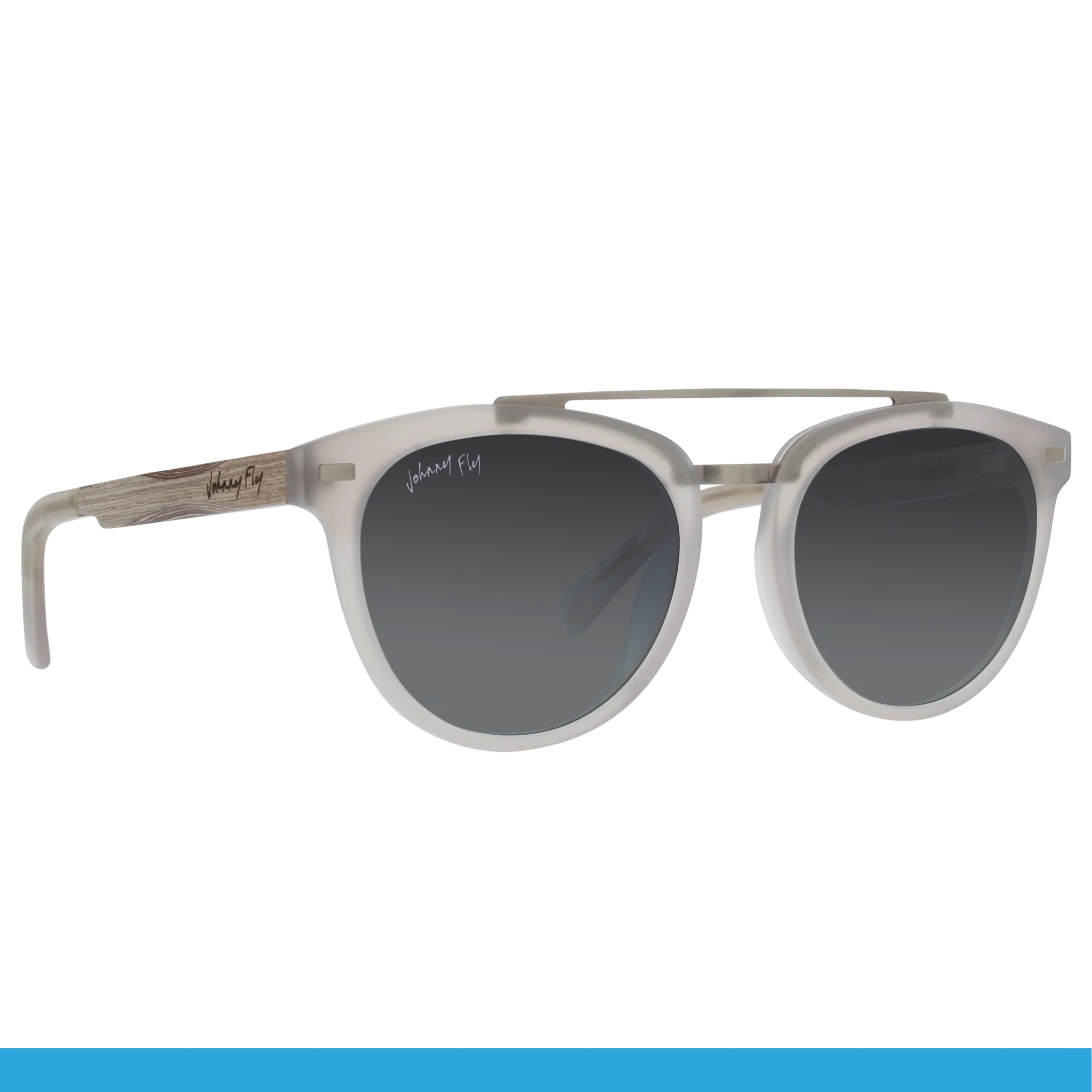 Introducing the Captain by Johnny Fly: These stylish sunglasses come with gray-tinted, polarized lenses and feature a matte, translucent acetate front section. The wooden arms are designed with a textured finish and include an elegantly inscribed logo on the side.