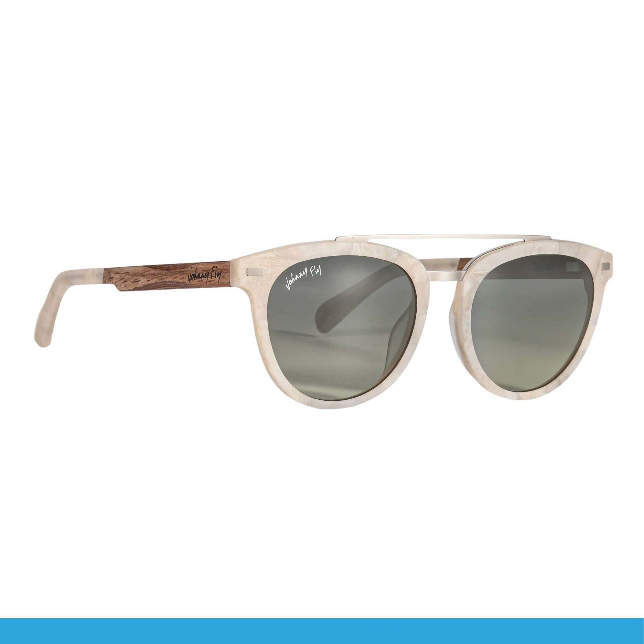 Introducing the Captain sunglasses by Johnny Fly, showcasing a sleek acetate front with round, polarized lenses. These stylish shades feature a white translucent frame paired with dark wooden arms, complete with engraved branding on the side for a sophisticated and modern appeal.