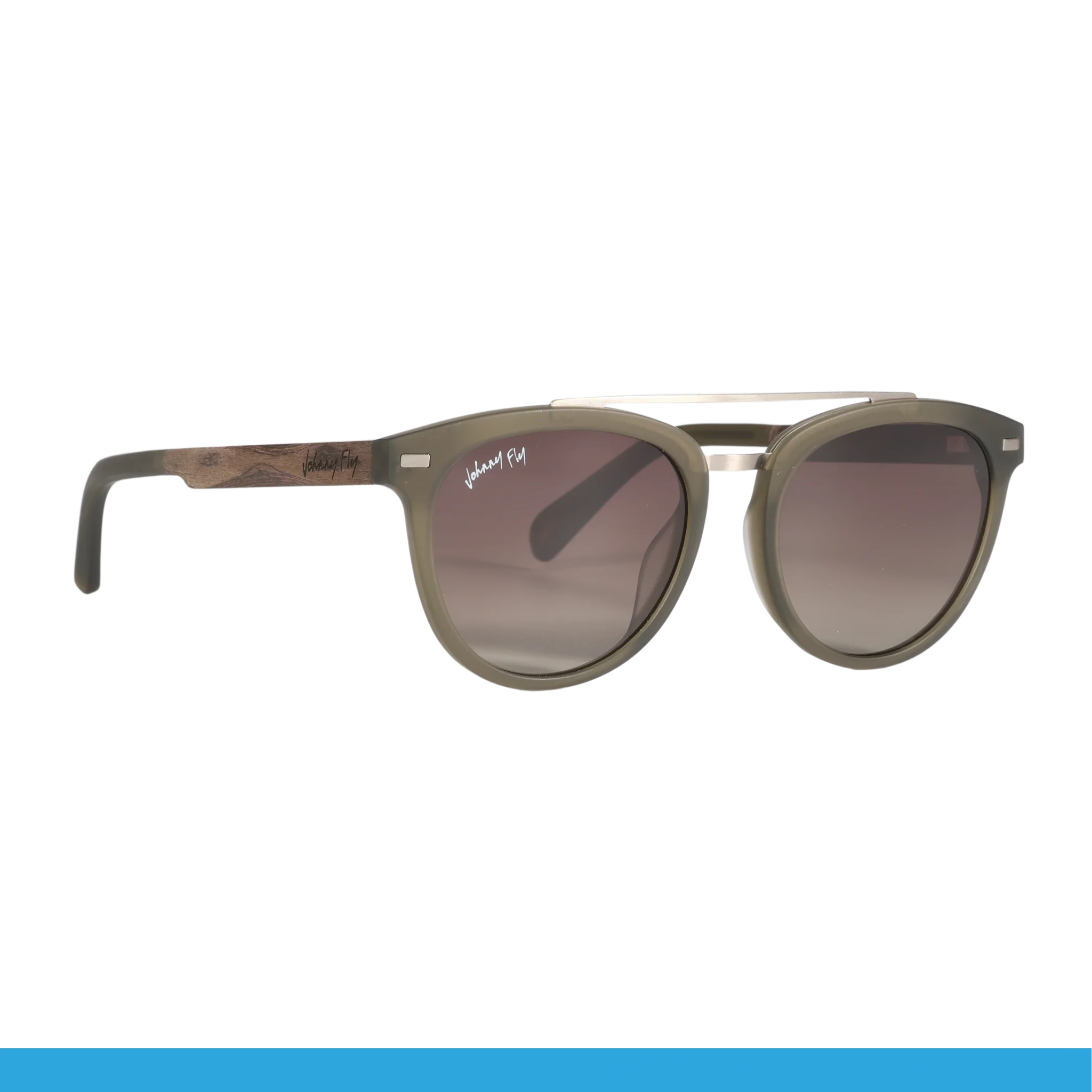 Introducing the Captain, a pair of stylish sunglasses from Johnny Fly. These sunglasses feature round frames with a chic acetate front section and slightly tinted, polarized lenses. The frames artfully blend translucent and solid materials, while the dark wooden arms display subtle inscriptions on the temple for added elegance.