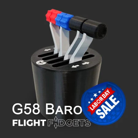 The G58 Baron - The Cup Holder Flight Fidget by FlightFidgets.com is a black desk toy with three levers (two blue, one red) and labels. Ideal for airplane lovers, it fits stylishly on any desk or in a cup holder.