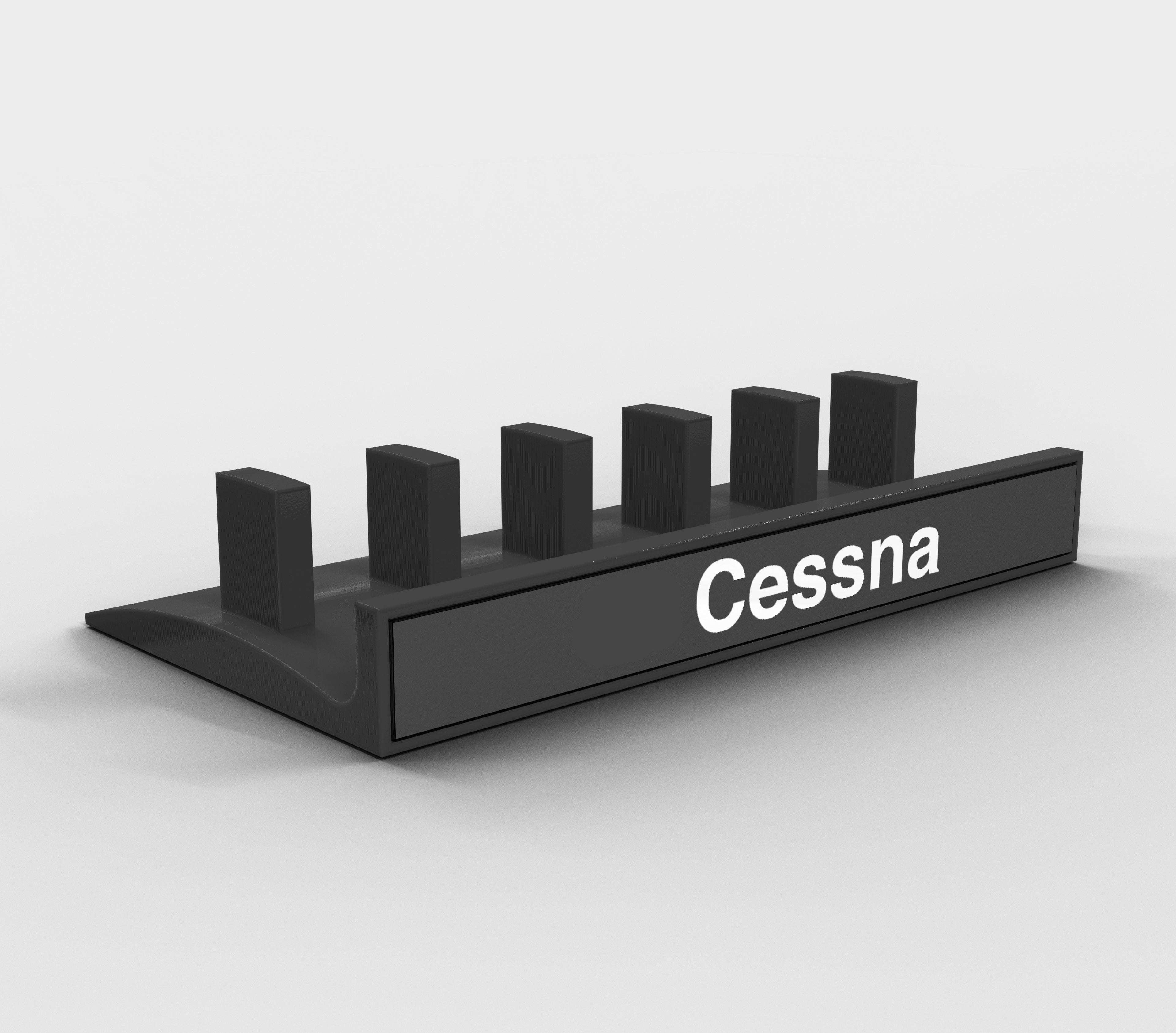 The Prodesksim Honeycomb Bravo Add-on ORGANZISER is a sleek black holder with "Cessna" in white text, featuring six vertical slots ideal for organizing levers, set against a white backdrop.