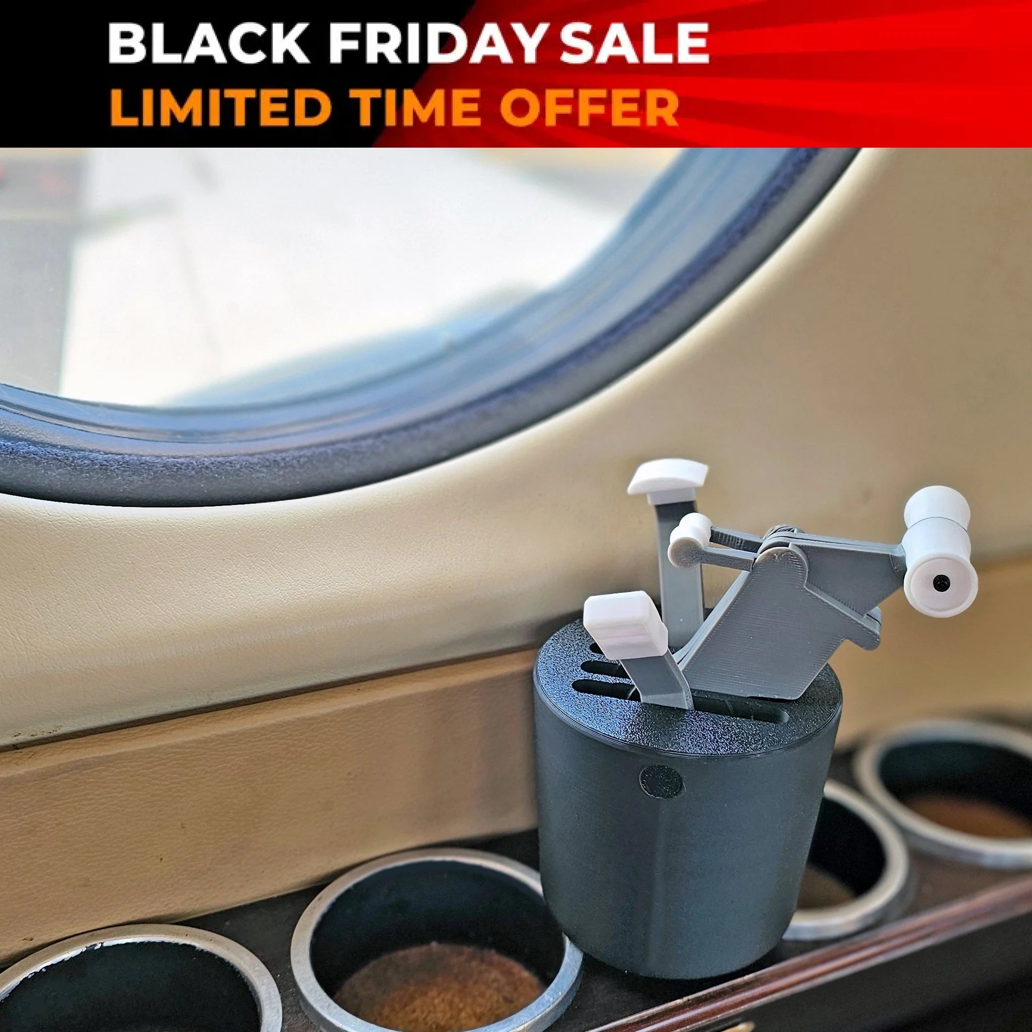 On the airplane window ledge, the Boeing 737 - The Cup Holder Flight Fidget in a black base provides a distinct sensory experience as it frames an outside view of the runway, making it an ideal choice for aviation enthusiasts who value intricate details. Brought to you by FlightFidgets.com.