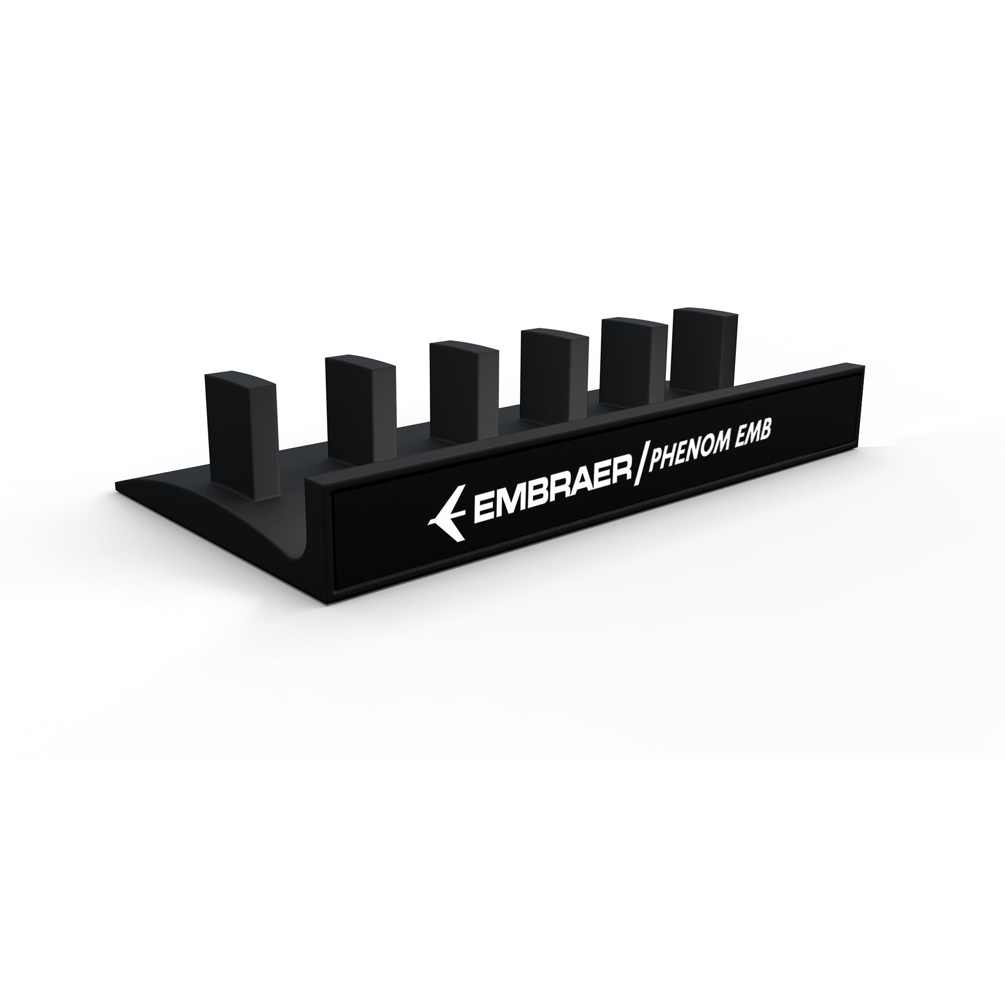 The Honeycomb Bravo Add-on ORGANIZER by ProDeskSim is a sleek black display stand adorned with the Embraer logo and "PHENOM EMB" in white, featuring six rectangular slots perfect for holding model airplanes or organizing Honeycomb Bravo levers with an aviation-inspired touch.