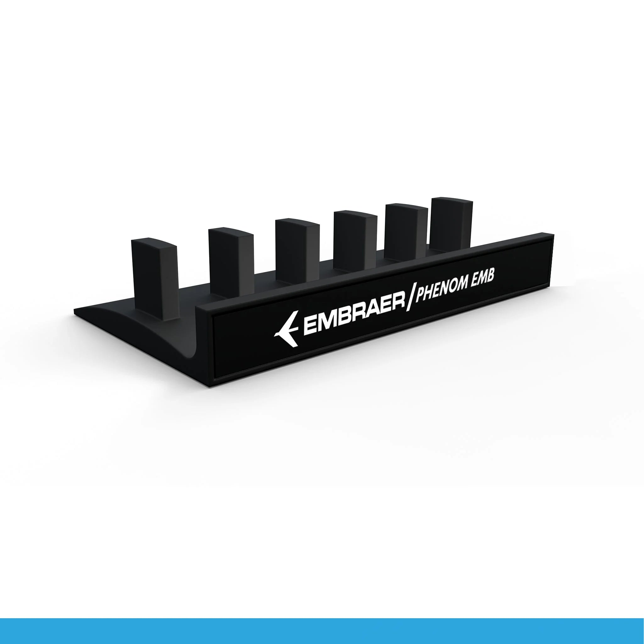 The Honeycomb Bravo Add-on ORGANIZER by ProDeskSim is a sleek black display stand adorned with the Embraer logo and "PHENOM EMB" in white, featuring six rectangular slots perfect for holding model airplanes or organizing Honeycomb Bravo levers with an aviation-inspired touch.