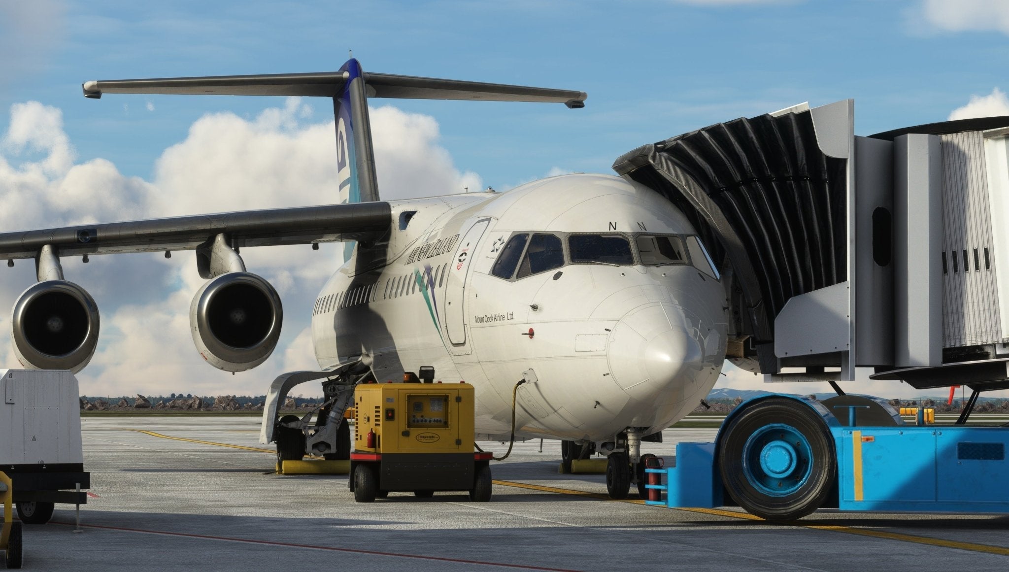 At the airport gate, a Just Flight BAE-146 Professional for MSFS2020 is parked and connected to a jet bridge. Ground service equipment, including a yellow power unit, is positioned near this aircraft from the Just Flight collection. The sky features partial cloud cover while the runway stays clear for takeoff within MSFS.