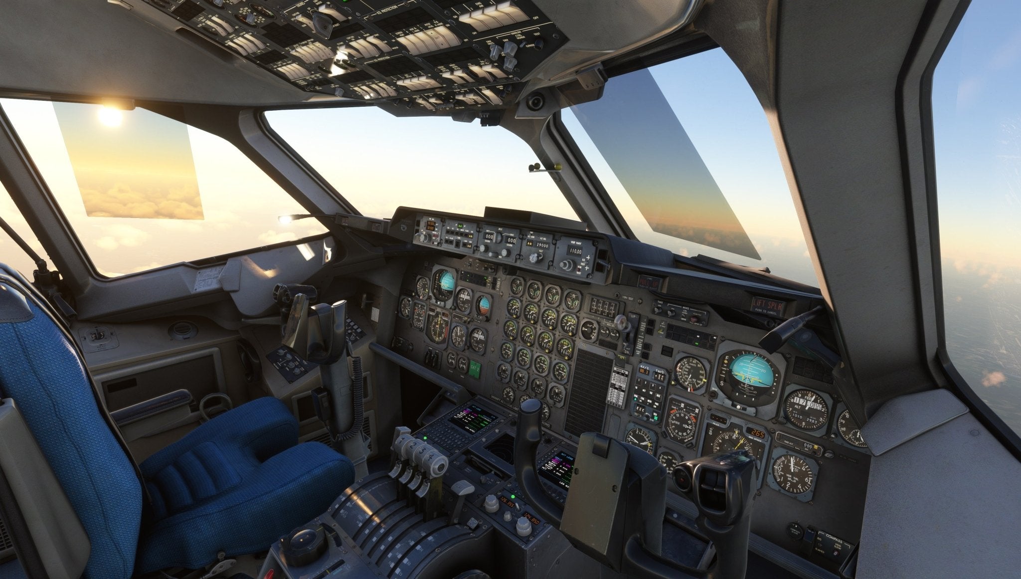 During flight, the cockpit of the Just Flight BAE-146 Professional for MSFS2020 features an advanced array of dials, gauges, and control panels. Outside, a clear sky with a setting sun bathes the instruments in a warm glow, while a blue pilot seat completes this MSFS-worthy display of aviation excellence.