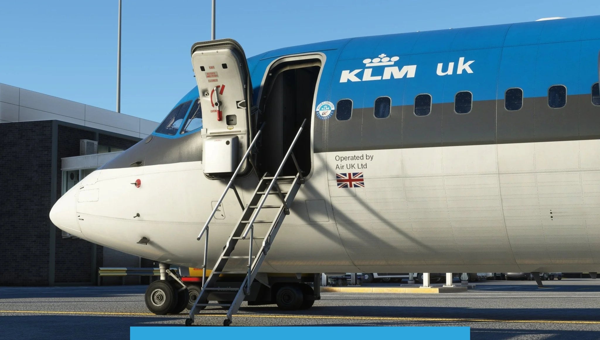 A Just Flight BAE-146 Professional for MSFS2020 aircraft, stylishly painted in black and blue, is stationed at an airport. The boarding door is open invitingly with a metal staircase connected. Near the entrance, the British flag waves proudly alongside the words "Operated by Air UK Ltd," capturing the essence of 146 Professional in MSFS by Just Flight.