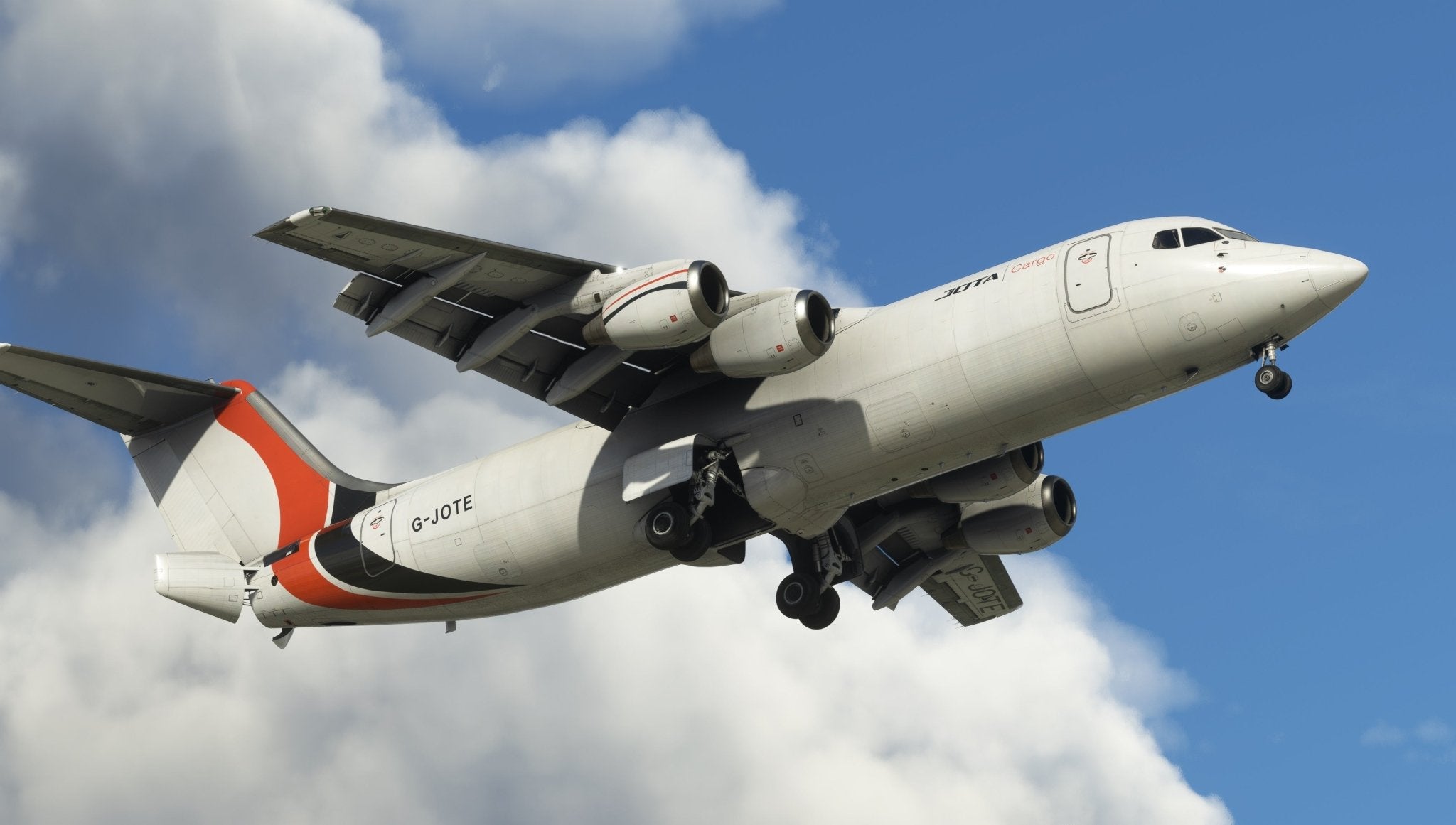 A white cargo airplane with red and black accents, featuring the "Just Flight" emblem, flies against a blue sky. The Just Flight BAE-146 Professional for MSFS2020 model displays its landing gear in a photograph taken from a slightly lower angle against the clouds.