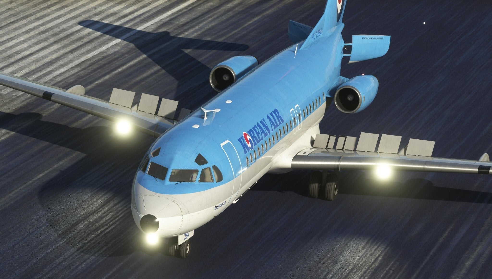 A striking scene captures the Just Flight Fokker-28 Professional for MSFS2020, adorned with the Ryanair logo, as it takes off or lands with its landing lights glowing. Its shadow elegantly moves along the tarmac below, highlighting its close proximity to the ground.