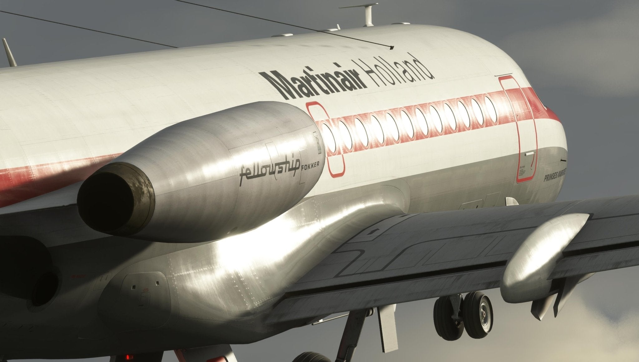 Close-up of a vintage plane featuring "Martinair Holland" on its side. The aircraft boasts a classic design with a silver body and red stripes, akin to the Just Flight Fokker-28 Professional for MSFS2020. The image captures the plane in flight, showcasing the engines and underside reminiscent of a Just Flight simulation.