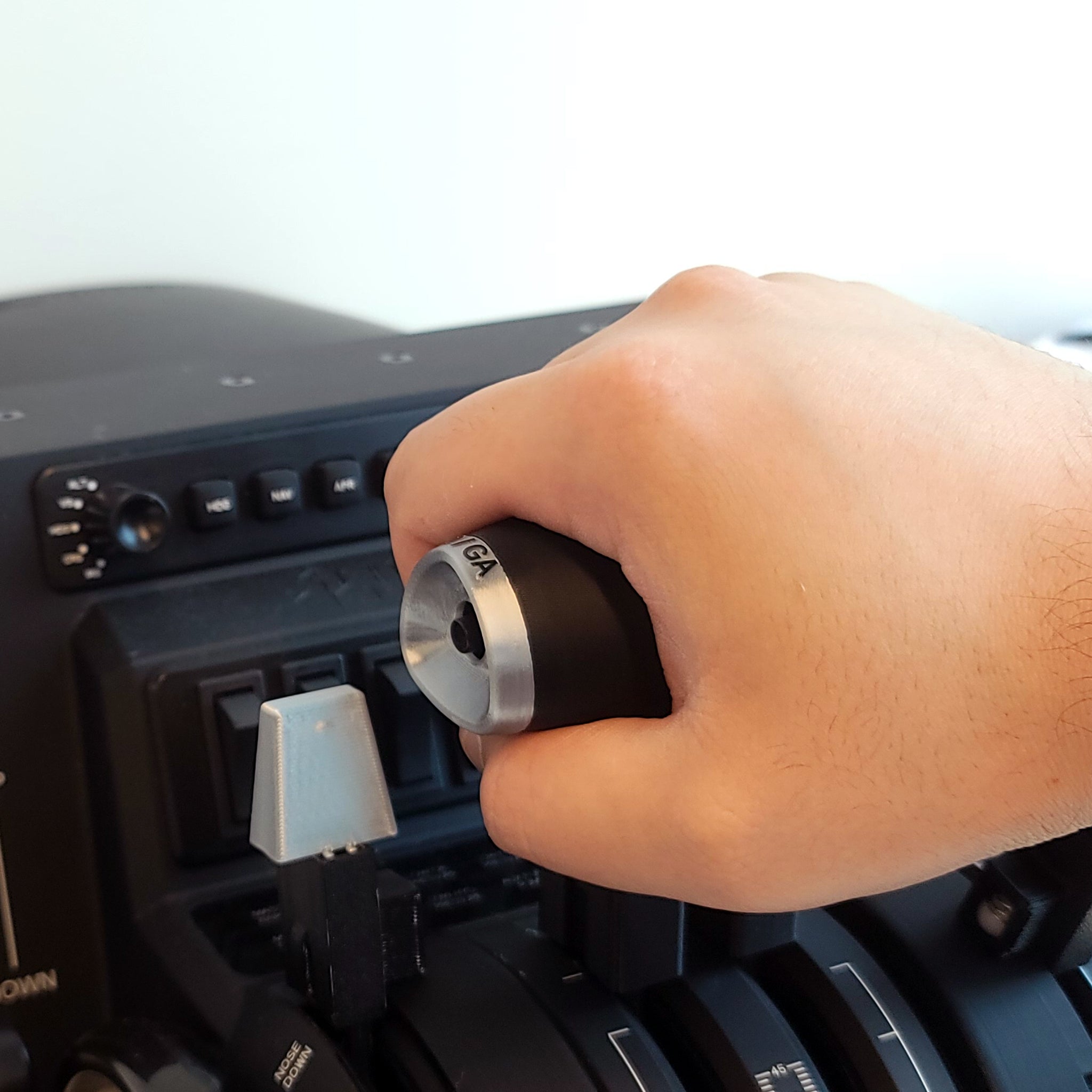 A hand gripping the NEW! HA-420 HondaJet Throttle Lever Set by Prodesksim in a flight simulator cockpit, highlighting the functional GA buttons, flaps, and speed brake detents on the Honeycomb Bravo throttle quadrant. The panel features various controls, emphasizing the throttle lever set and suggesting an immersive flight simulation experience or pilot training environment.