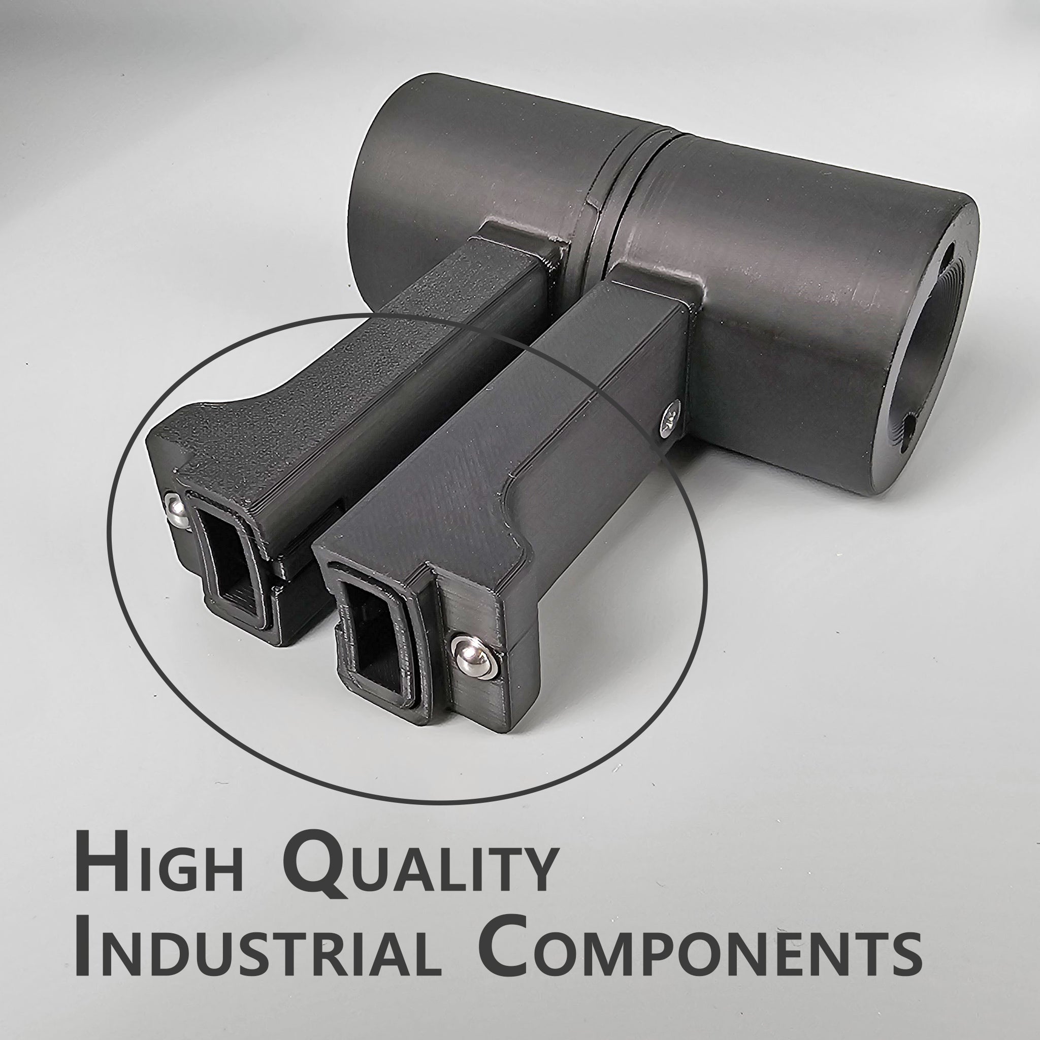 Two industrial components in black, similar to the ProDeskSim Citation CJ4 V2 Addon/Mod for the HoneyComb Bravo Throttle Quadrant with Detent from Prodesksim, rest on a gray background. The design includes two rectangular arms connected to a cylindrical base, with "High Quality Industrial Components" gracefully noted in the bottom left corner.