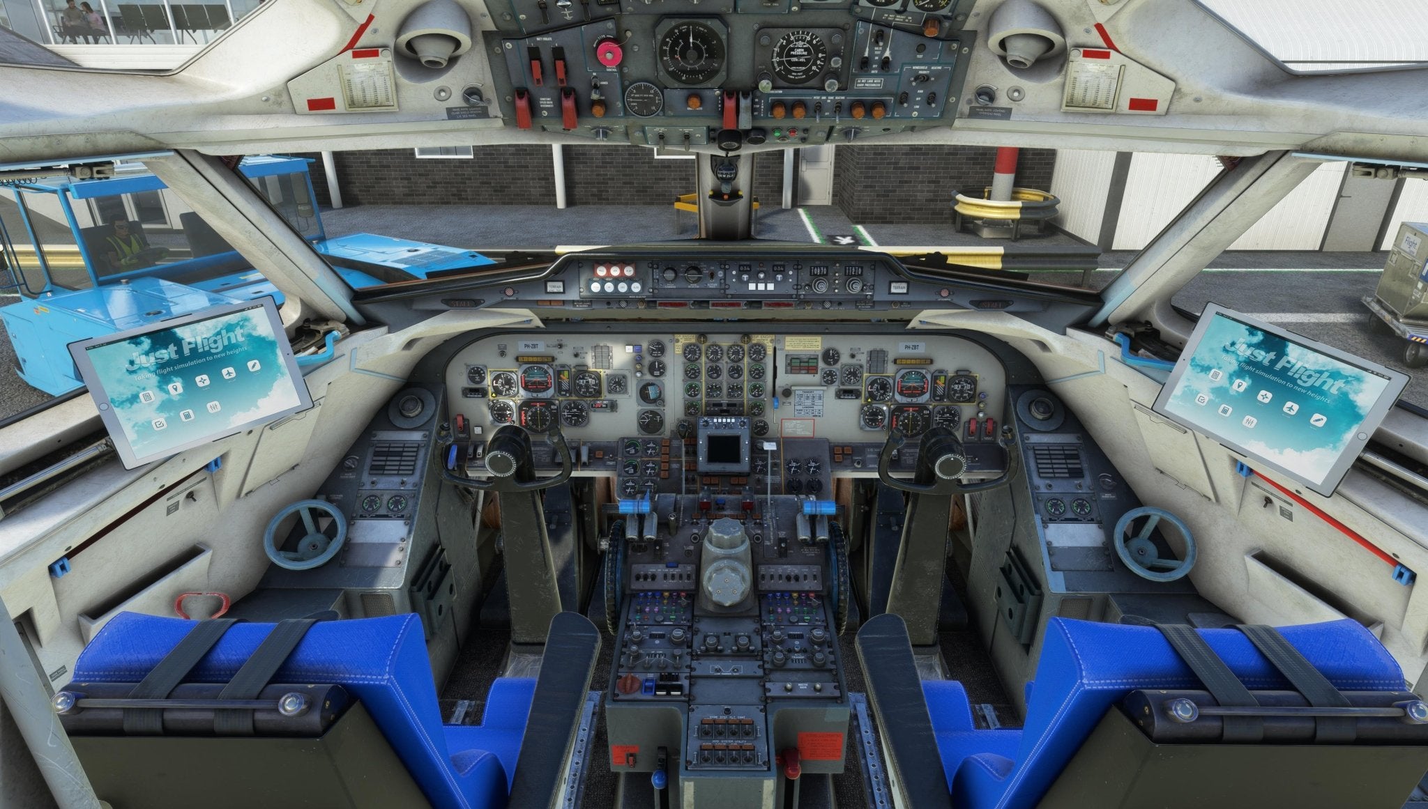 The image displays the cockpit of a Just Flight Fokker-28 Professional for MSFS2020, featuring various control panels filled with buttons, switches, and screens. Two blue pilot seats can be seen, and the digital readouts on the left showcase "Test Flight," underscoring Just Flight's dedication to realism.