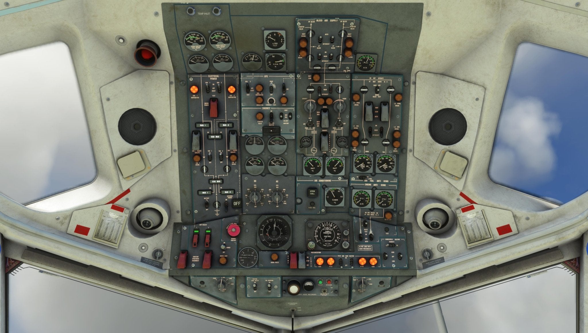 The cockpit control panel of the Just Flight Fokker-28 Professional for MSFS2020 is equipped with an array of gauges, switches, and buttons, all set on a modern gray panel. Just Flight provides an immersive experience with views through the side windows that reveal a cloudy sky, encapsulating the essence of the F28 regional jet.