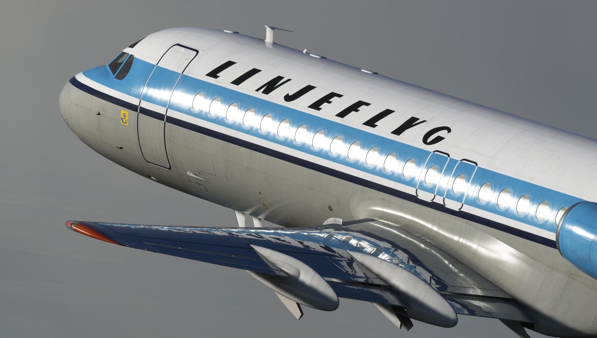 A detailed view of a vintage aircraft evokes the Just Flight Fokker-28 Professional for MSFS2020, its fuselage featuring the elegant "LINJEFLYG" branding. This aircraft showcases a timeless blue and white color scheme, complemented by its distinct engines and wing design, soaring gracefully beneath a cloudy sky.