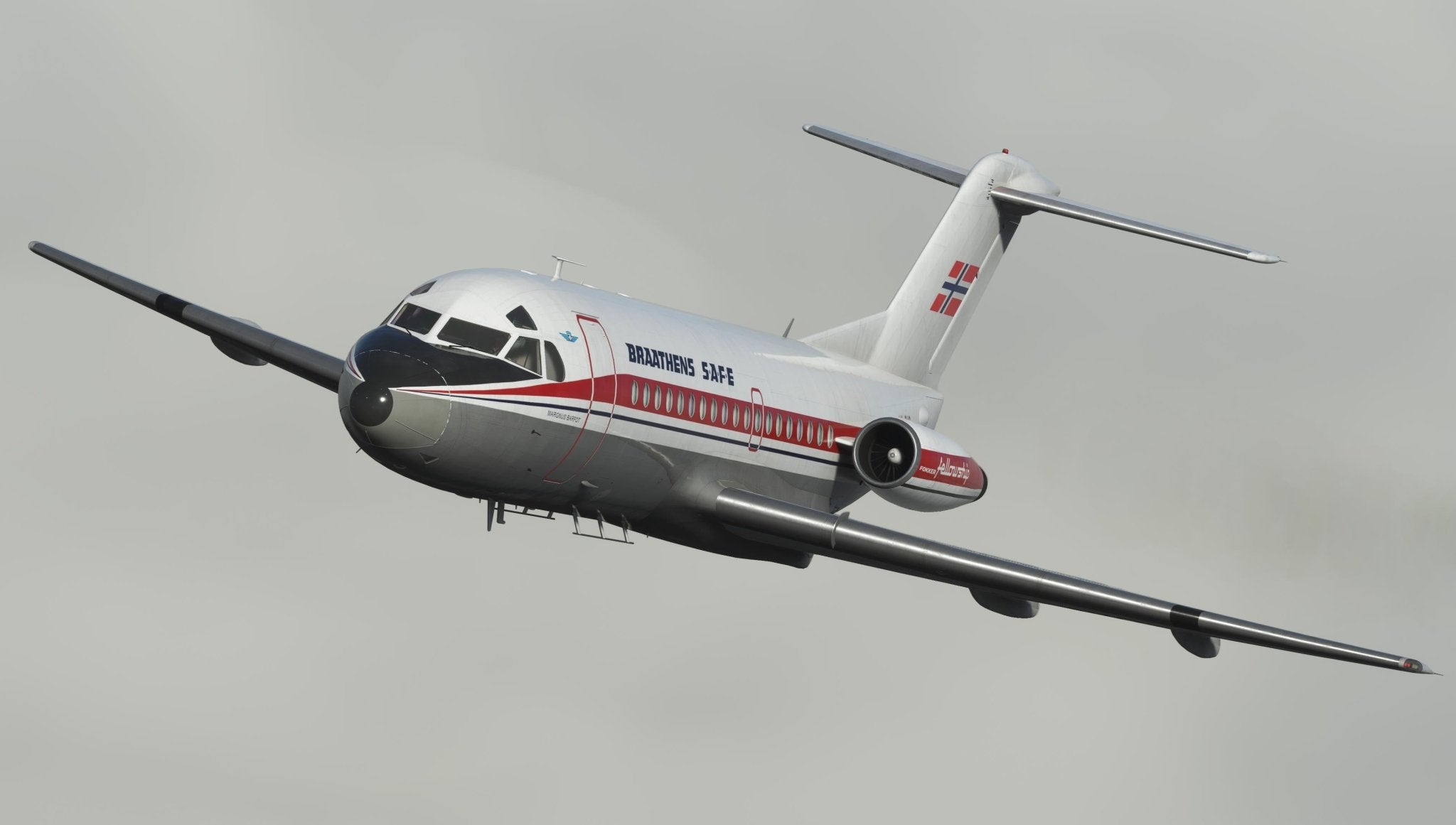 A Just Flight Fokker-28 Professional for MSFS2020, adorned with the British Airways livery, gracefully flies through a cloudy sky. The aircraft features a white body accentuated by red and blue stripes and a distinctive T-tail design that enthusiasts of Just Flight would admire.