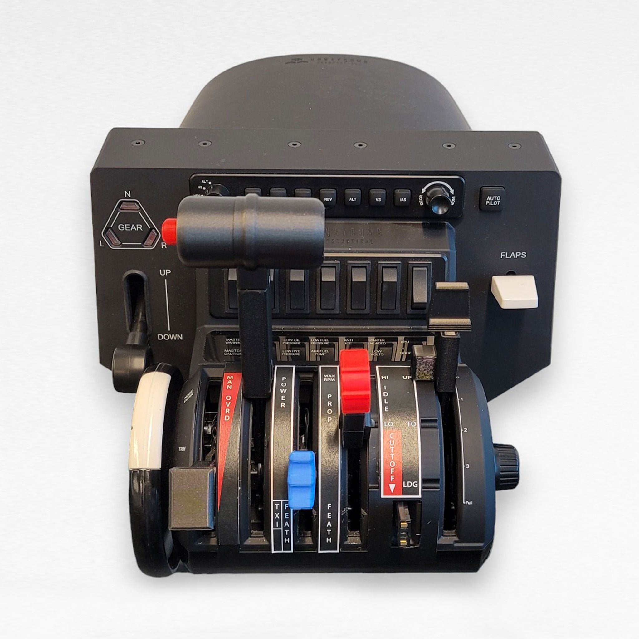 Introducing the NEW! ProDeskSim TBM 850 V2 throttle quadrant mod addon for the Honeycomb Bravo by Prodesksim. This control panel is designed for a seamless flight simulation experience, featuring a black base with various levers and switches. It includes three main levers with colored labels, a gear handle, and several buttons for flight adjustments that mimic the TBM 850 throttle setup.